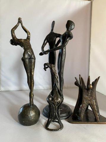 Unknown - Miniatuur beeldje - Set van vier abstracte bronzen