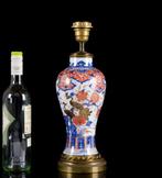 Een grote Chinese Imari-vergulde balustervaas Pauw