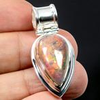 Extreem zeldzame Ethiopische opaal - Dieprode reflexen -