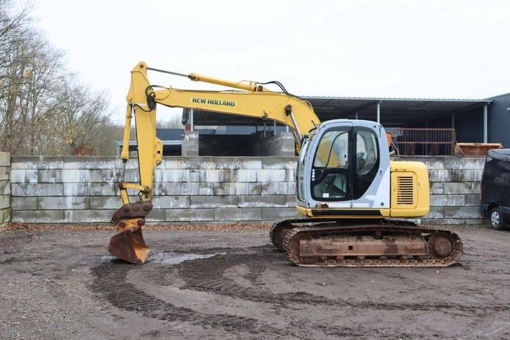 Veiling: Rupsgraafmachine New Holland/Kobelco E115SR Diesel, Zakelijke goederen, Machines en Bouw | Kranen en Graafmachines, Ophalen