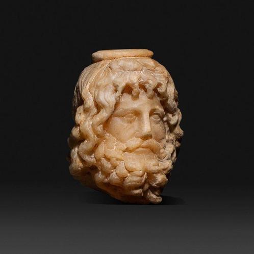 Romain antique Albâtre Tête de Sérapis. 1er - 2ème siècle, Verzamelen, Mineralen en Fossielen