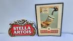 Stella Artois - Reclamebord (2) - Metaal, karton glascoide