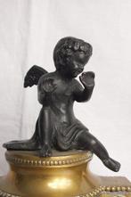 sculptuur, 2 Schouwstukken. - 23 cm - Brons - Natuursteen.