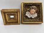 Lijst (2) - Hout, Keramiek - Koppel kaders cherub.