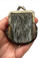 Curieuze en wilde kleine tas of portemonnee van traditioneel