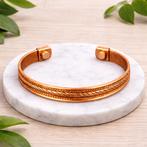 Koperen klemarmband met gevlochten motief, Ophalen of Verzenden