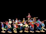 Icône - Timpo Toys : cowboys en plastique dans une scène de