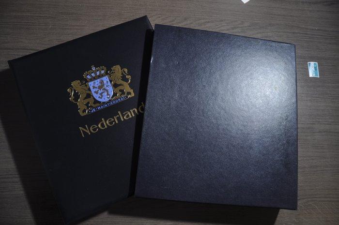 Nederland - Verzameling in een luxe DAVO album met cassette, Postzegels en Munten, Postzegels | Nederland