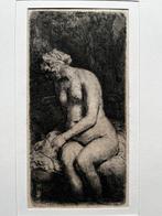 Rembrandt Van Rijn (1606-1669) - Woman bathing her feet at a, Antiek en Kunst