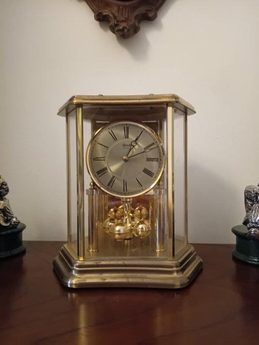 Torsie-slinger pendule - USM Haller - Glas, Metaal -, Antiek en Kunst, Curiosa en Brocante