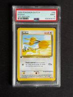 Pokémon - 1 Graded card - Doduo 48 First edition - PSA 9 -, Hobby en Vrije tijd, Nieuw