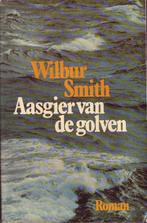 Aasgier van de golven 9789010025302, Boeken, Gelezen, Wilbur Smith, N.v.t., Verzenden
