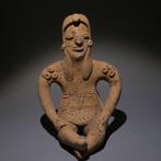 Colima, Westkust Mexico Terracotta Zittend figuur. 10 cm H.
