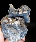 anglesiet Kristallen op galenamatrix geel fluorescerend. -