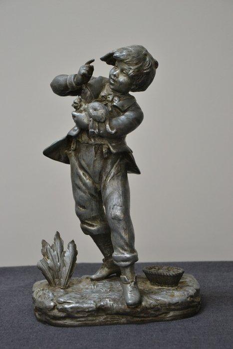 Beeld van een jongen met een kat - 30,6 cm - Figurine -  (1), Antiquités & Art, Curiosités & Brocante