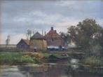 Chris van der Windt (1877-1952) - Een Hollands landschap met