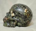 Realistische uitgehouwen schedel Hand en Cristal de Plumita