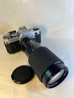 Canon AE-1 + Canon 70 / 210 mm lens zoom / macro Single lens