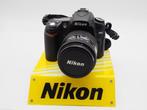 Nikon D90 camera + 28-105mm lens (inclusief accessoires), Nieuw