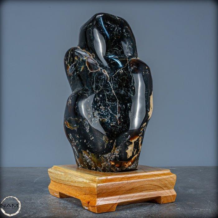 Incroyable ambre naturel rouge / bleu Freeform sur stand-, Antiek en Kunst, Curiosa en Brocante