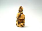 Een ongebruikelijke Netsuke van een Sarumawashi