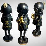 AmsterdamArts - Banksy x Chanel deep sea diver gold