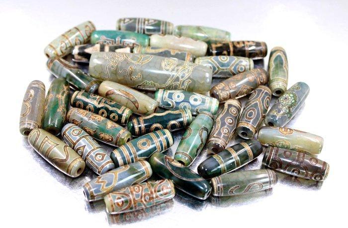 Belle collection de 34x Très beaux beads DZI en agate, Antiek en Kunst, Antiek | Speelgoed