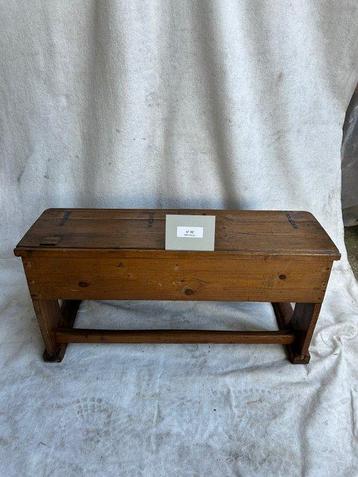 Old solid wood school desk from the first half of the 20th