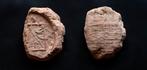 Oud-Romeins Aardewerk Tessera die een monogram afbeeldt