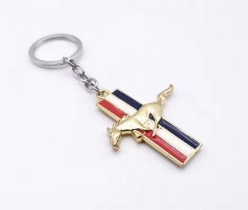 Mustang Spinning Tri-Bar Logo Gold beschikbaar voor biedingen