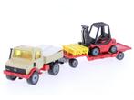 Schaal 1:55 Siku 2522 Unimog U 1500 met heftruck #6714, Hobby en Vrije tijd, Ophalen of Verzenden, Gebruikt