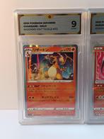 Pokémon - 2 Graded card - Charizard Shocking Volt Tackle &, Hobby en Vrije tijd, Nieuw