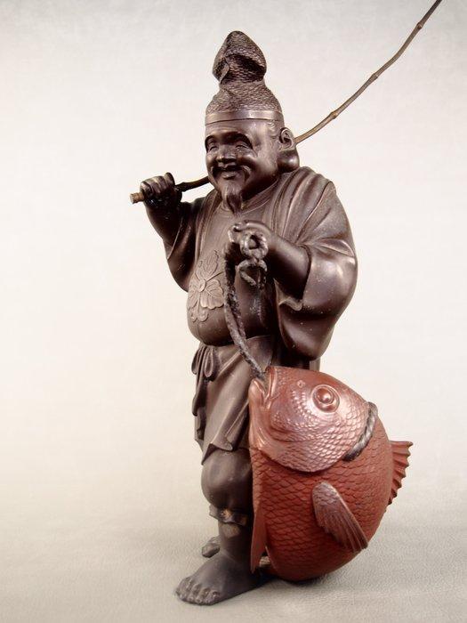 Tin - Katsuhiko  - Ebisu is een godheid die geassocieerd, Antiquités & Art, Antiquités | Autres Antiquités