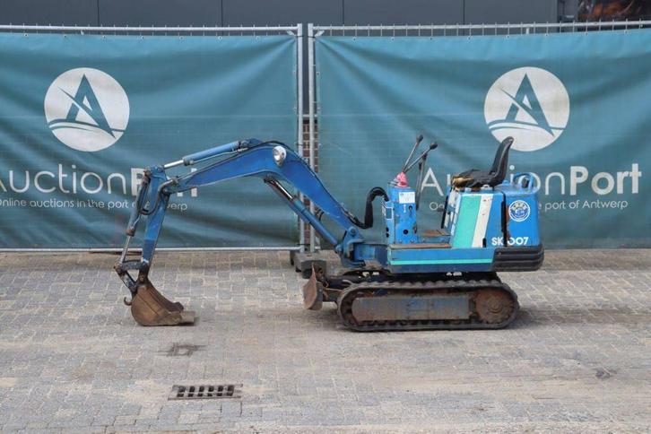 Veiling: Minigraver Kobelco SK007 Diesel, Zakelijke goederen, Machines en Bouw | Kranen en Graafmachines, Ophalen