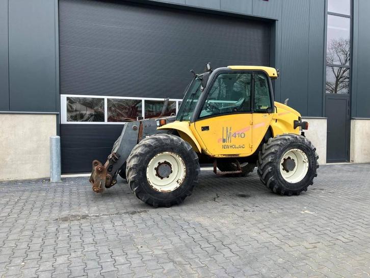 Veiling: Verreiker New Holland LM410 Diesel 2800kg 2003, Articles professionnels, Machines & Construction | Grues & Excavatrices