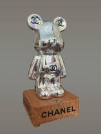 AmsterdamArts - Chanel fireworks bear light statue
