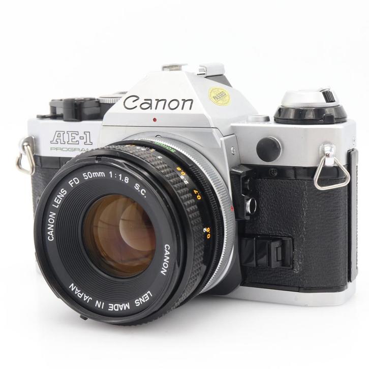 Canon AE-1 program zilver + 50mm F/1.8 S.C. | Tweedehands, Audio, Tv en Foto, Foto | Lenzen en Objectieven, Zo goed als nieuw