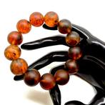 Armband met grote Baltische amber kralen, 32,5 gram -