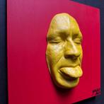 gregos - Yellow mockery on red background