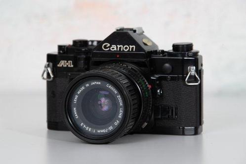 Canon A-1 schwarz + FD 3,5-4,5/35-70mm | Appareil photo, Audio, Tv en Foto, Fotocamera's Analoog