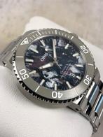 Oris - Aquis Date Upcycle Automatic - Sans Prix de Réserve -, Handtassen en Accessoires, Horloges | Heren, Nieuw