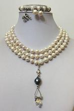 Perles blanches avec pendentif démonté avec perle noire