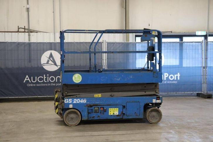 Veiling: Schaarlift Genie GS-2046 Elektrisch 8.10m 2014, Zakelijke goederen, Machines en Bouw | Liften, Steigers en Ladders, Ophalen