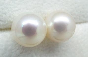 Sans Prix de Réserve - Boucles doreilles cloutées - 14