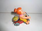 Marx - Wilmar uit The Flintstones op een driewieler met bel,