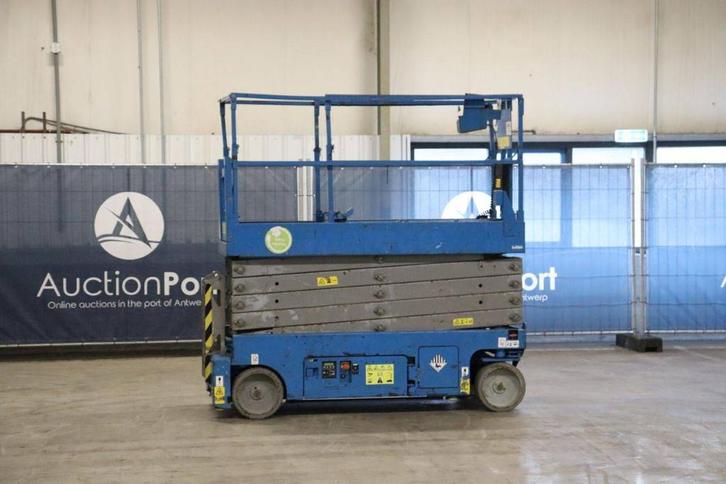 Veiling: Schaarlift Genie GS-3232 Elektrisch 11.75m 2014, Zakelijke goederen, Machines en Bouw | Liften, Steigers en Ladders, Ophalen