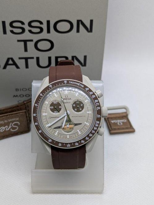 Swatch - MoonSwatch - Mission to Saturn - Sans Prix de, Handtassen en Accessoires, Horloges | Heren