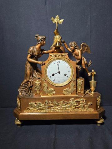 Horloge de cheminée avec personnage - Gaston Jolly Empire -, Antiek en Kunst