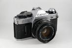 Canon AE-1 Program + FD 1,8/50mm Analoge camera, Audio, Tv en Foto, Nieuw