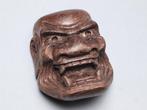Netsuke – Noh-mask Shikami  Ondertekend Tomohisa  -